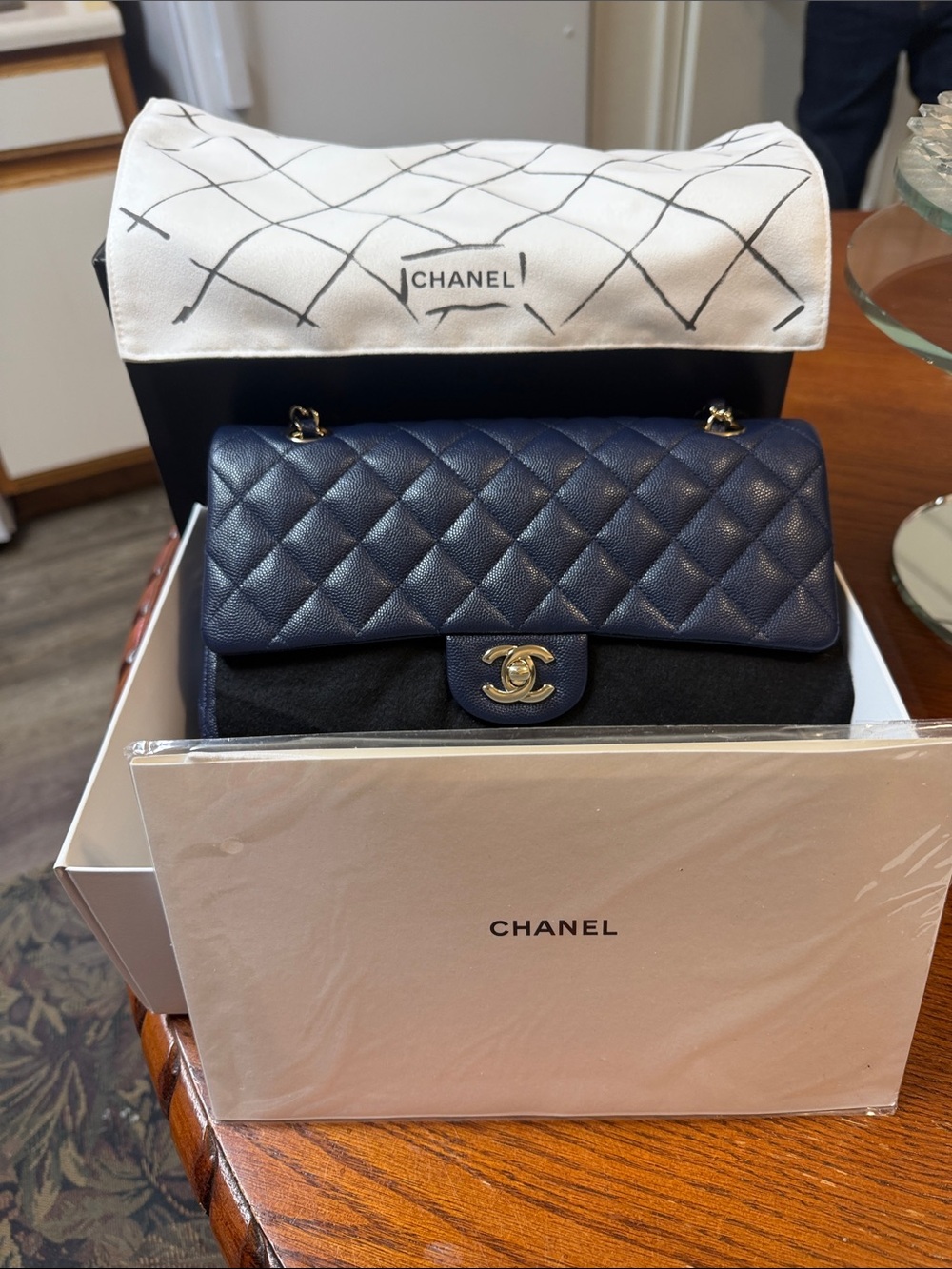 Authentic Chanel Medium Classic Double
Flap Navy Caviar Silver HW 29-Series